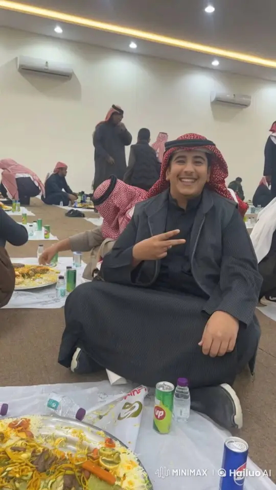 Young Man Enjoying Communal Meal and Smoking – AI Generated Video | Hailuo AI