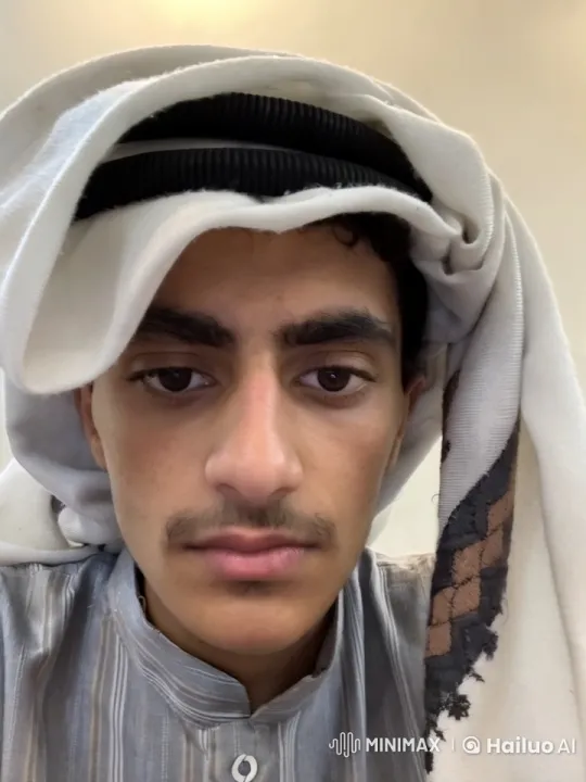 Young Man Contemplates in Traditional Attire, Smokes Serenely – AI Generated Video | Hailuo AI