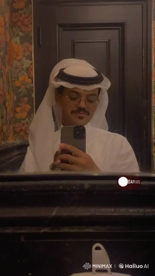 Traditional Attire, Smoking in Dimly Lit Room – AI Generated Video | Hailuo AI