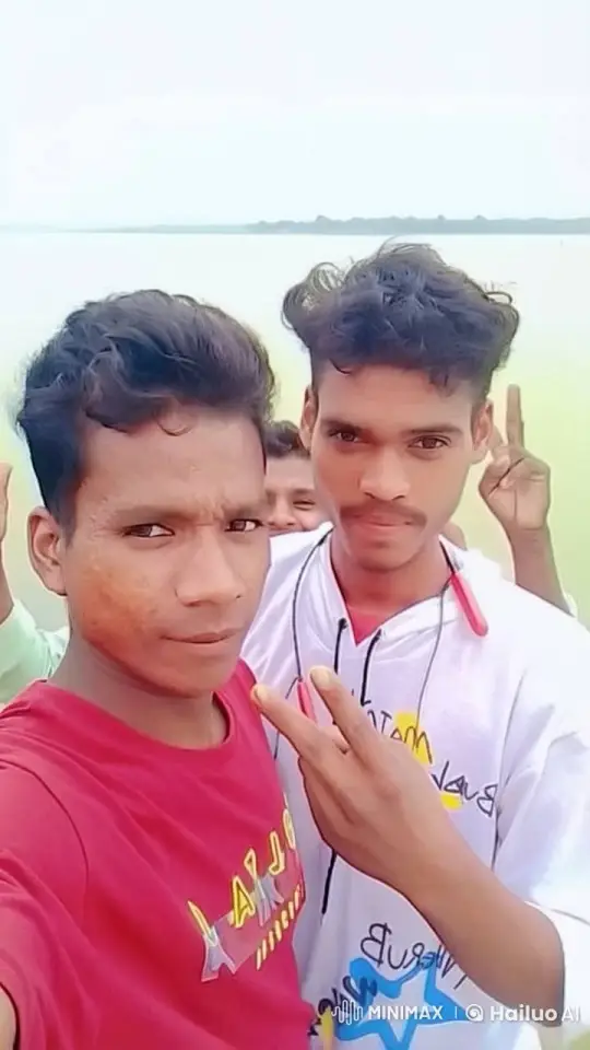 Two Friends Enjoying a Peaceful Day by the Water – AI Generated Video | Hailuo AI