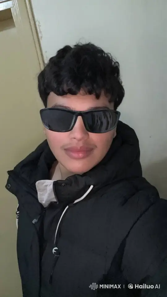 Person Smokes Calmly Against Indoor Background – AI Generated Video | Hailuo AI