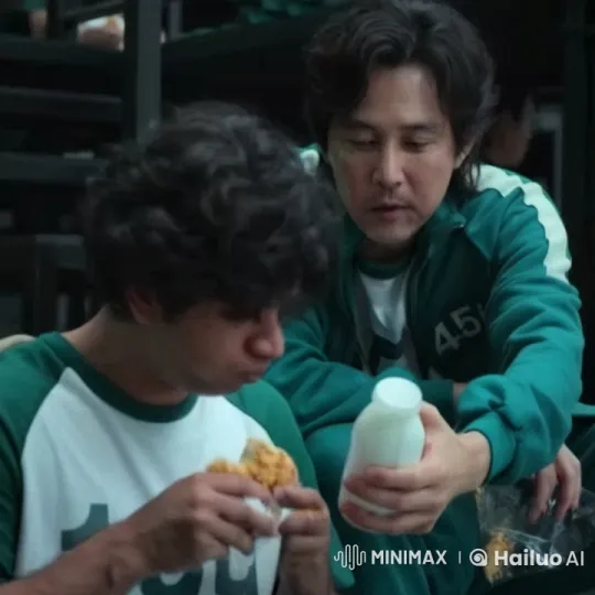 Gi Hun and Ali Share a Moment Over Fried Chicken – AI Generated Video | Hailuo AI