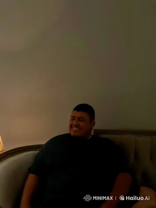 Man Smokes Cigarette on Couch with Serene Ambiance – AI Generated Video | Hailuo AI