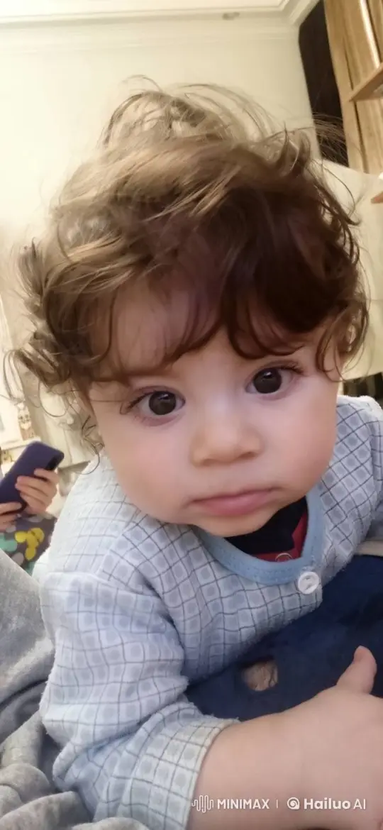 Curious Baby Smiles and Cooes at Camera – AI Generated Video | Hailuo AI