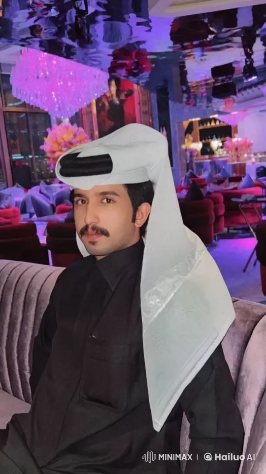 Man Relaxing in Elegant Lounge with Traditional Attire – AI Generated Video | Hailuo AI