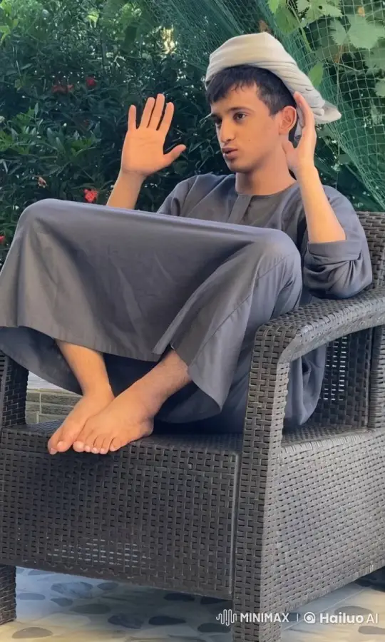 Young Man in Traditional Attire Mimics Smoking in Nature – AI Generated Video | Hailuo AI
