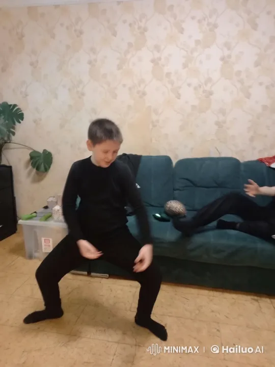 Boy in Black Performs Backflip, Lifts Sofa with Ease – AI Generated Video | Hailuo AI