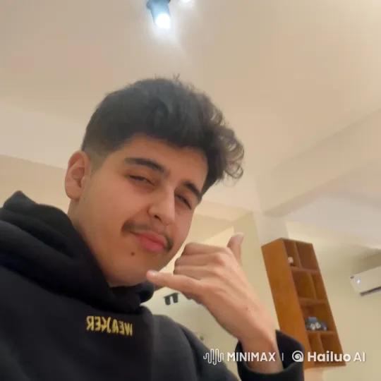 Young Man in Minimalist Room Smokes Cigarette – AI Generated Video | Hailuo AI