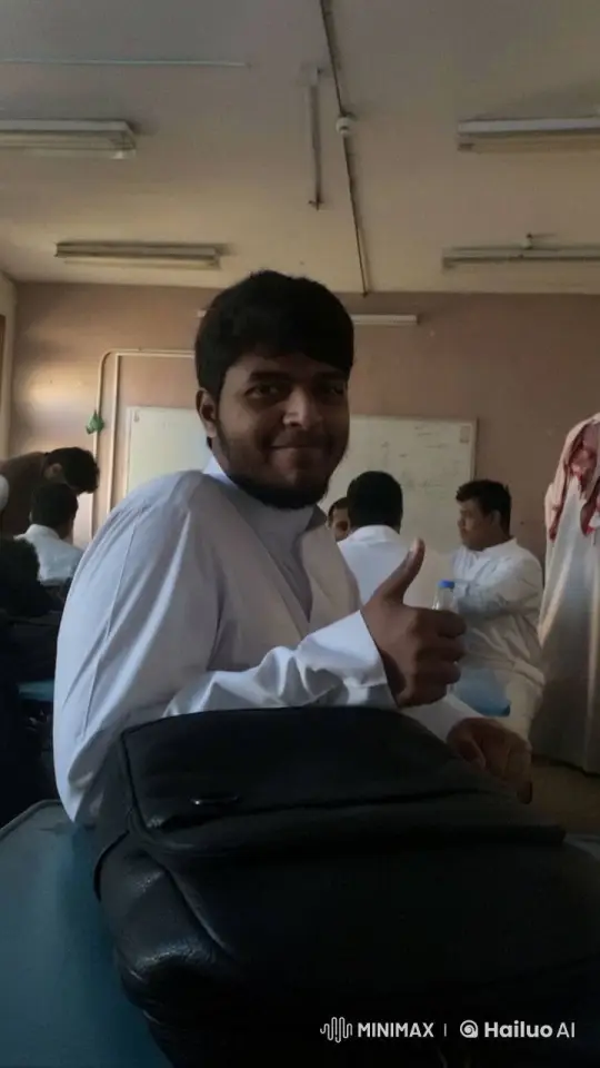 Young Man Smokes in Classroom Setting – AI Generated Video | Hailuo AI