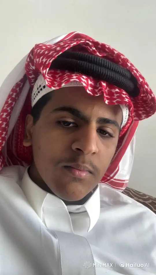 Young Man in Traditional Attire Contemplates with a Cigarette – AI Generated Video | Hailuo AI