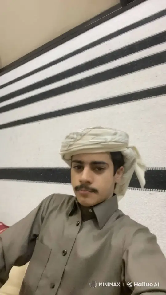 Young Man Smokes Cigarette in Traditional Attire – AI Generated Video | Hailuo AI