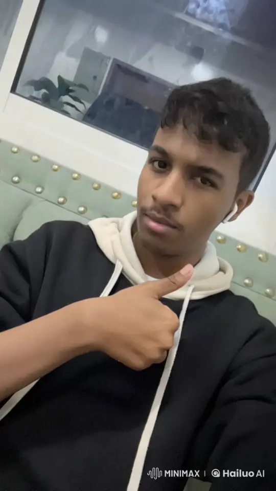 Young Man Smoking Calmly on Couch – AI Generated Video | Hailuo AI