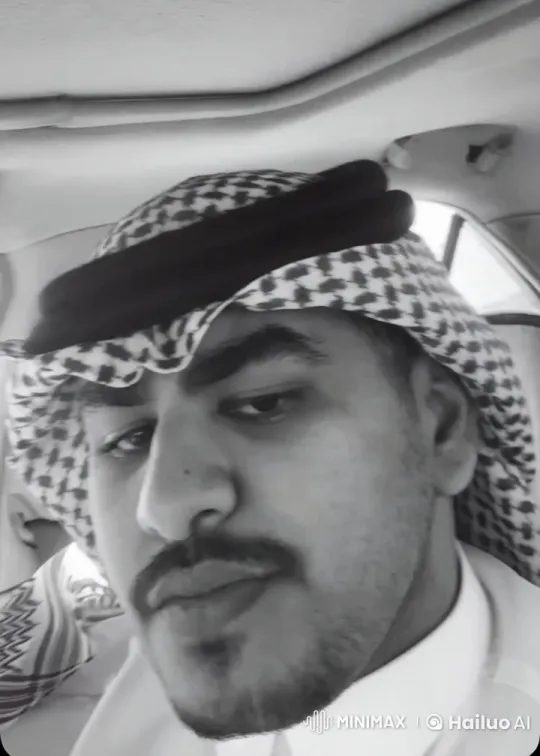 Man Smokes Calmly in Car with Traditional Attire – AI Generated Video | Hailuo AI