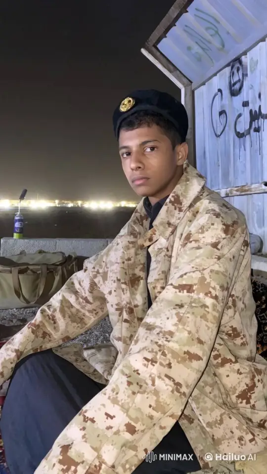 Contemplative Man Smoking in Nighttime Outdoor Setting – AI Generated Video | Hailuo AI