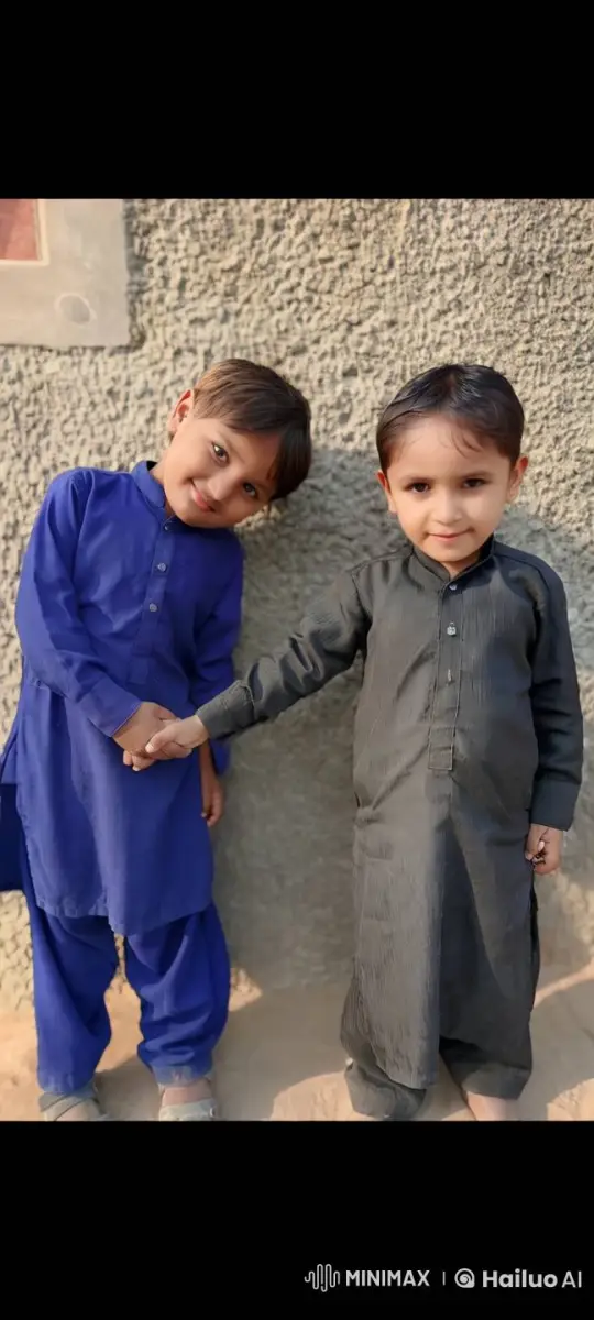 Two Children in Traditional Attire Holding Hands on Sunlit Path – AI Generated Video | Hailuo AI