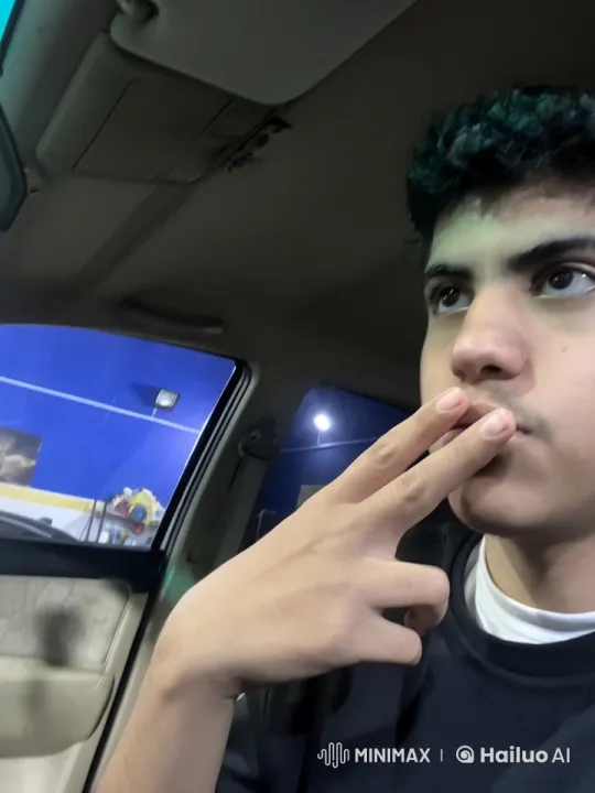 Young Man Simulates Smoking in Car with Realistic Movements – AI Generated Video | Hailuo AI