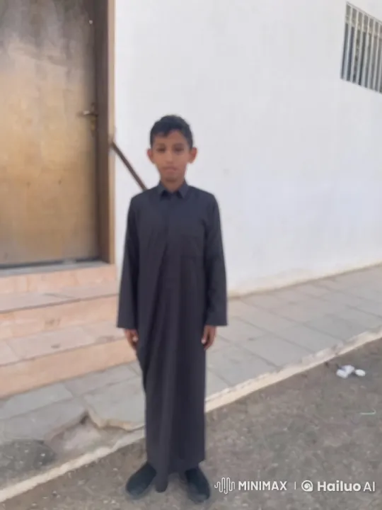 Young Boy Smoking in Front of Building – AI Generated Video | Hailuo AI