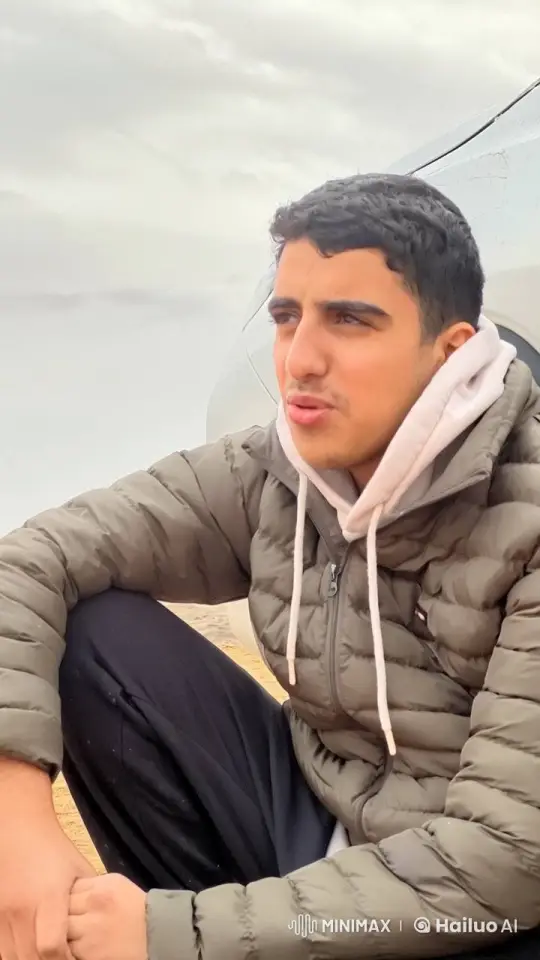Young Man Contemplates in Overcast Weather – AI Generated Video | Hailuo AI