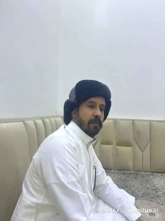 Man Reflecting with Cigarette in Brightly Lit Room – AI Generated Video | Hailuo AI