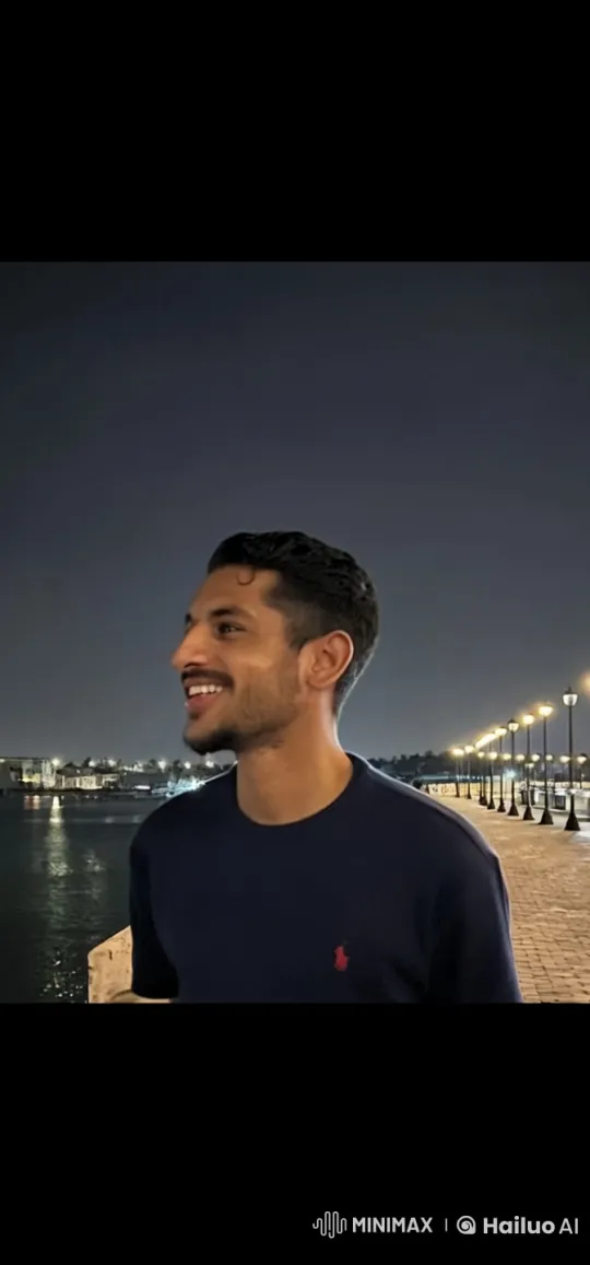 Nightly Reflection: Person Smokes by Waterfront – AI Generated Video | Hailuo AI