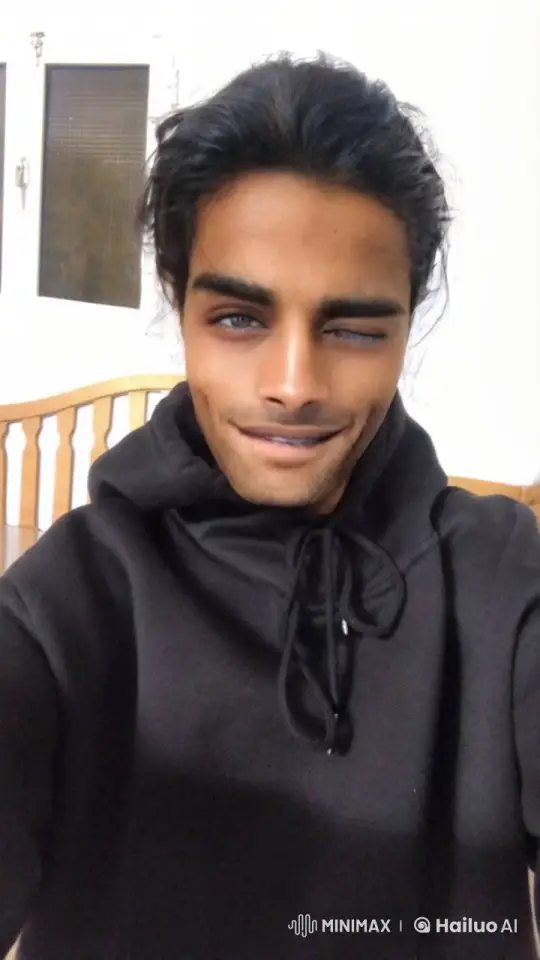 Confident Person Winks, Smokes in Relaxed Setting – AI Generated Video | Hailuo AI