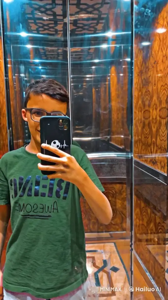 Young Person Mimics Smoking in Elegant, Mirrored Elevator – AI Generated Video | Hailuo AI