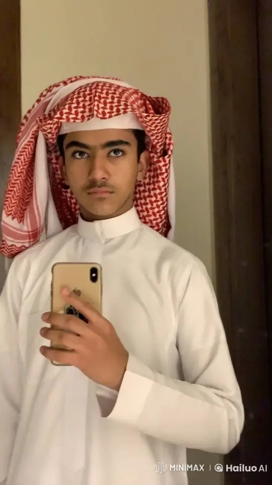 Young Person in Traditional Attire Takes Selfie Smoking – AI Generated Video | Hailuo AI