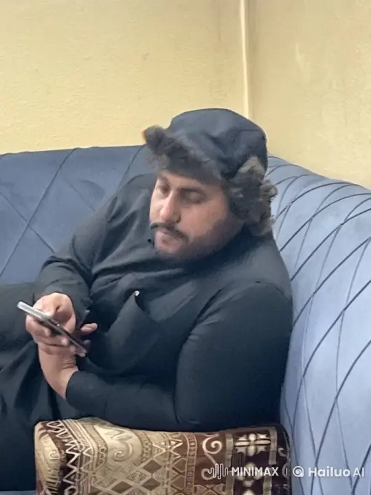 Cozy Couch Moment: Smoking and Phone Browsing – AI Generated Video | Hailuo AI