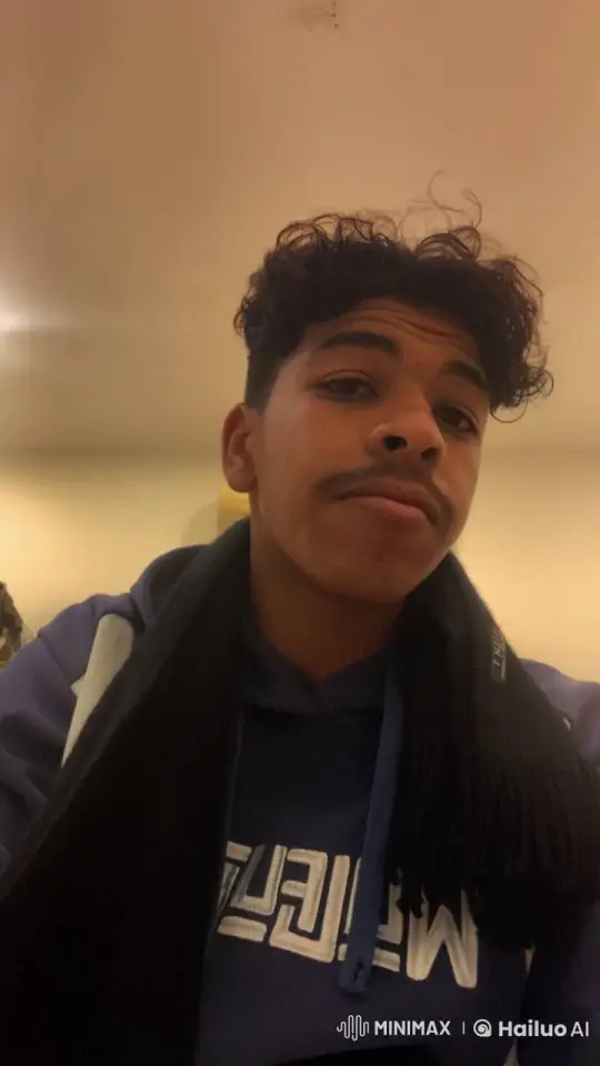 Young Man Smoking in a Cozy Indoor Setting – AI Generated Video | Hailuo AI