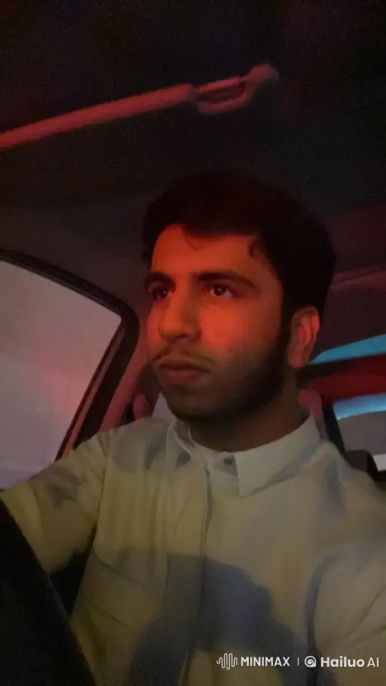 Man Smokes Calmly in Dimly Lit Car Interior – AI Generated Video | Hailuo AI