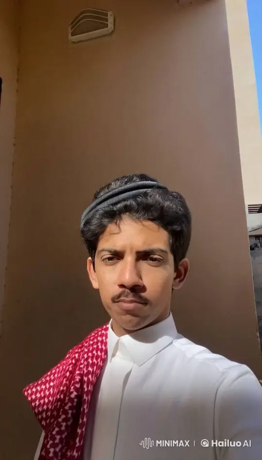 Traditional Attire: Person Smoking in Calm Outdoor Setting – AI Generated Video | Hailuo AI