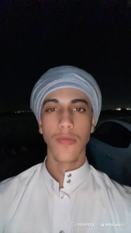 Young Man Smoking Outdoors at Night – AI Generated Video | Hailuo AI