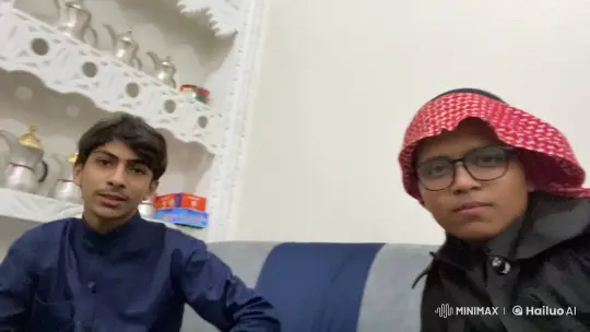 Cozy Living Room Scene with Two Individuals – AI Generated Video | Hailuo AI