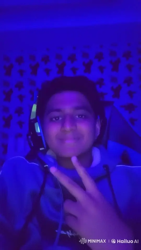 Relaxed Person Smoking in Blue-Lit Room – AI Generated Video | Hailuo AI