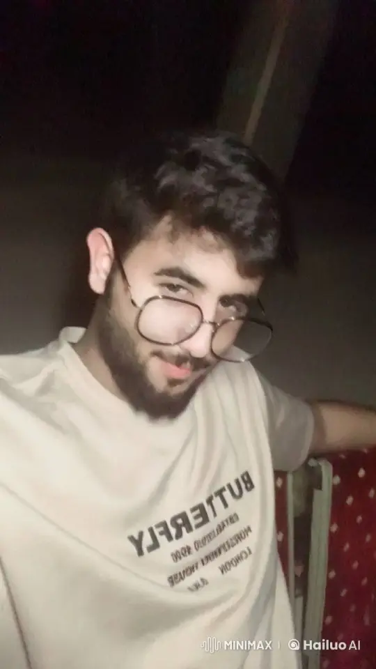 Man Smoking in Dim Light with Reflective Mood – AI Generated Video | Hailuo AI