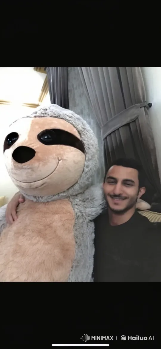 Man Smoking with Plush Sloth Toy – AI Generated Video | Hailuo AI