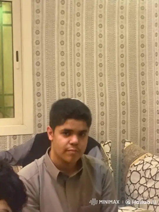 Young Man Smoking in Patterned Room – AI Generated Video | Hailuo AI