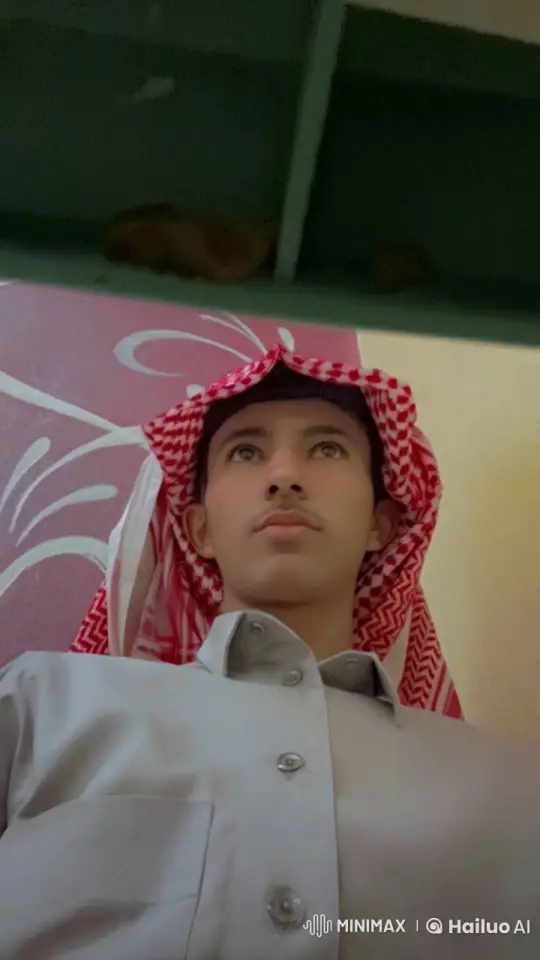 Young Man Contemplates with Cigarette in Traditional Attire – AI Generated Video | Hailuo AI
