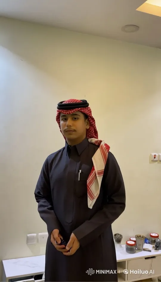 Young Man Smokes Deliberately in Traditional Attire – AI Generated Video | Hailuo AI