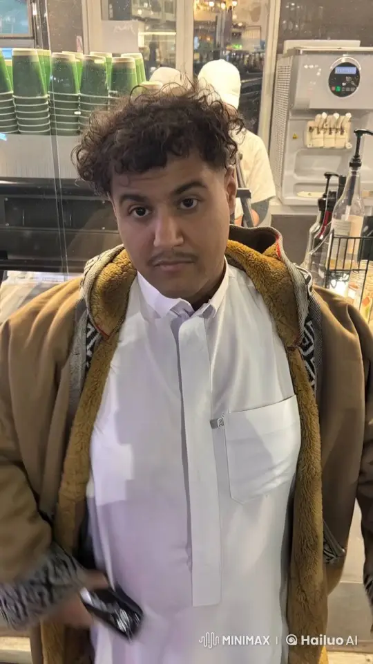 Person Smoking in Café with Gentle Atmosphere – AI Generated Video | Hailuo AI