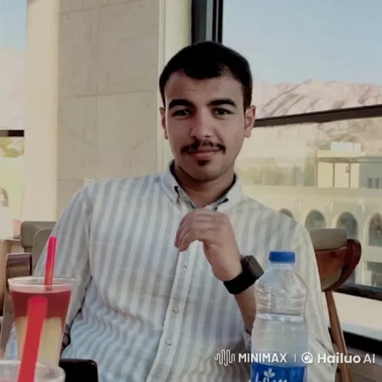 Young Man Smoking at Outdoor Café with Scenic View – AI Generated Video | Hailuo AI