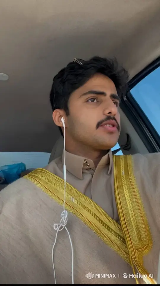 Man Smokes in Car with Traditional Attire – AI Generated Video | Hailuo AI