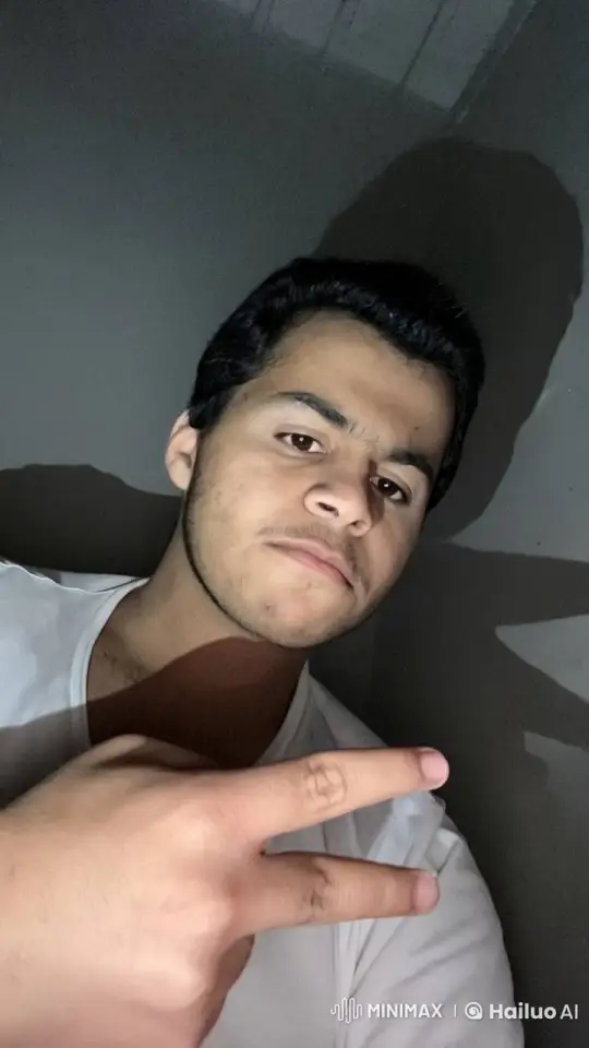 Young Man Reflects in Smoke-Filled Room – AI Generated Video | Hailuo AI