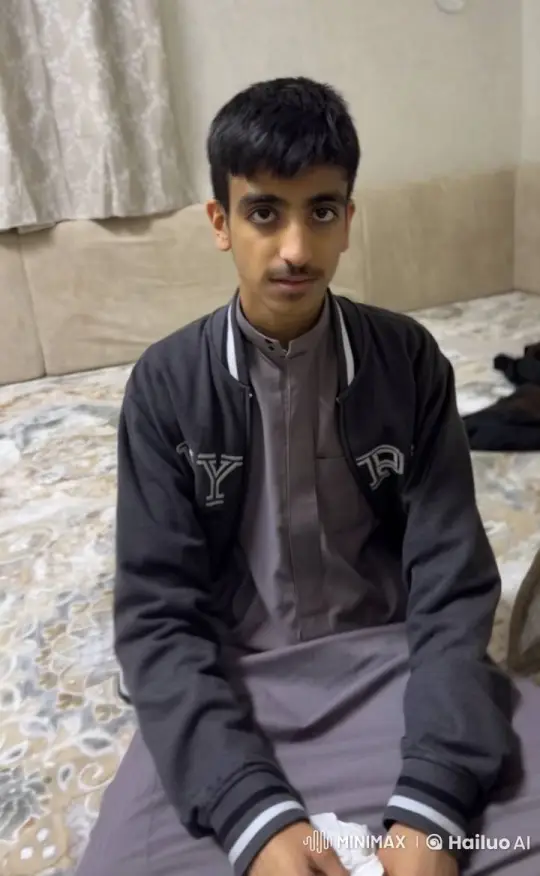 Young Man Lights Cigarette on Patterned Bed – AI Generated Video | Hailuo AI