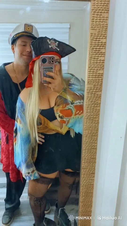 Couple in Costumes Shares Intimate Moment in Mirror – AI Generated Video | Hailuo AI