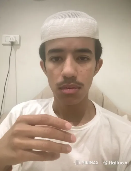 Young Man Reflects with a Cigarette Indoors – AI Generated Video | Hailuo AI