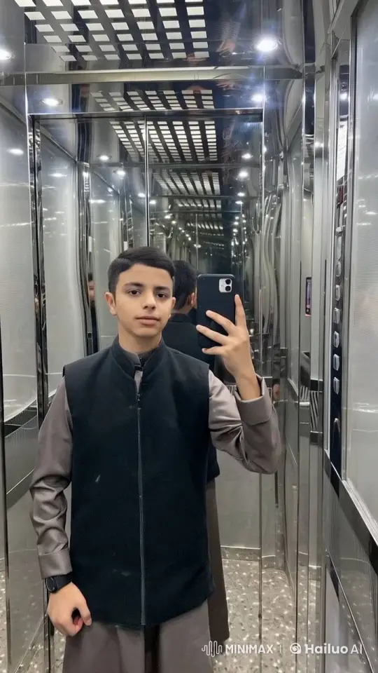 Young Man Takes Selfie in Reflective Elevator – AI Generated Video | Hailuo AI