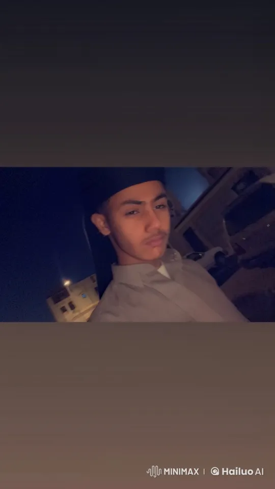 Young Man Smokes in Dimly Lit Urban Night – AI Generated Video | Hailuo AI