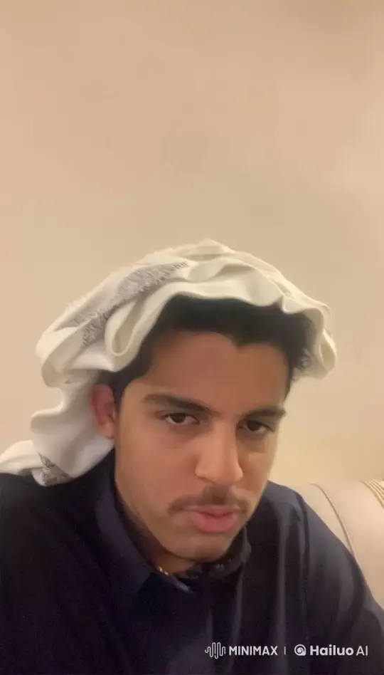 Traditional Headdress: Serene Smoking Scene – AI Generated Video | Hailuo AI