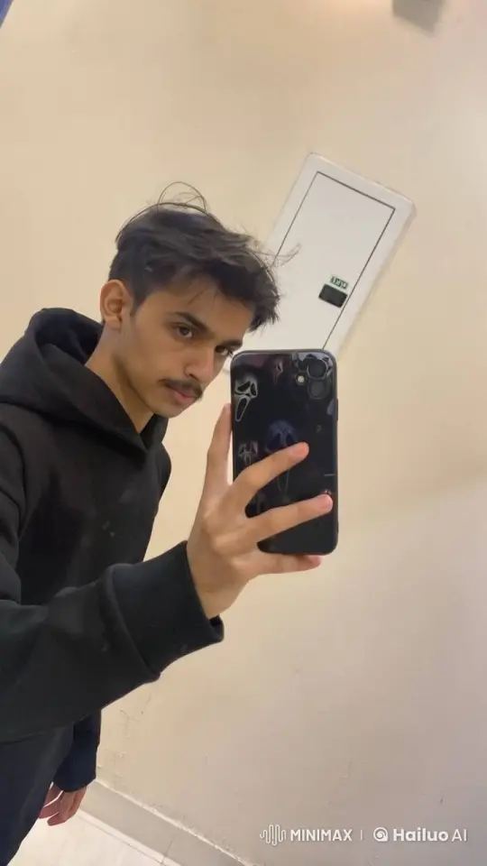 Young Man Smoking, Taking Selfie in Mirror – AI Generated Video | Hailuo AI